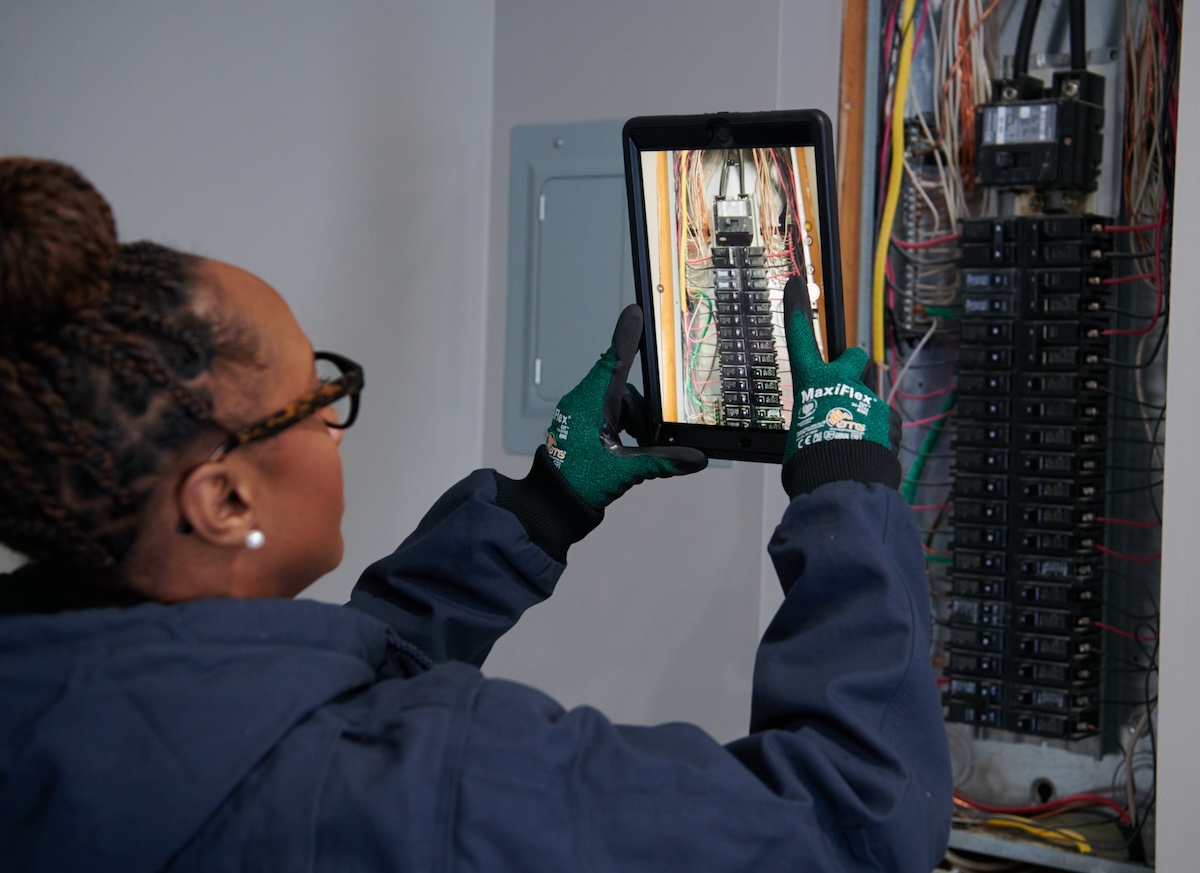 technician inspecting equipment