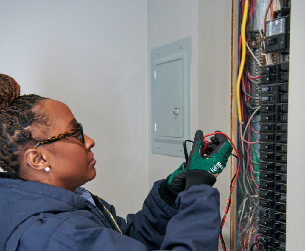 Electrical Repair 1 electrician working on electrical panel