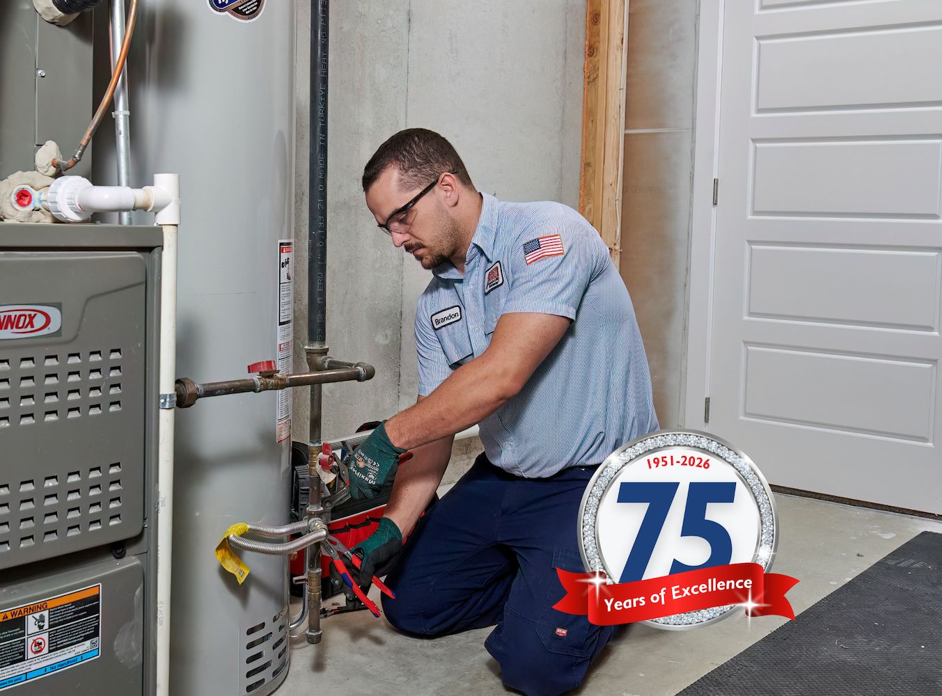 technician working on a water heater